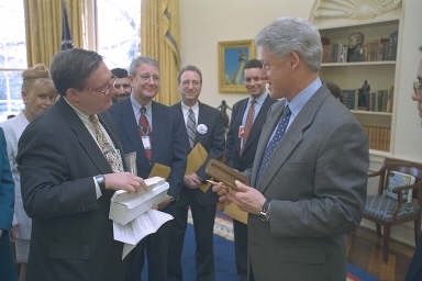 Making a presentation to President Clinton in the Oval Office in 2000