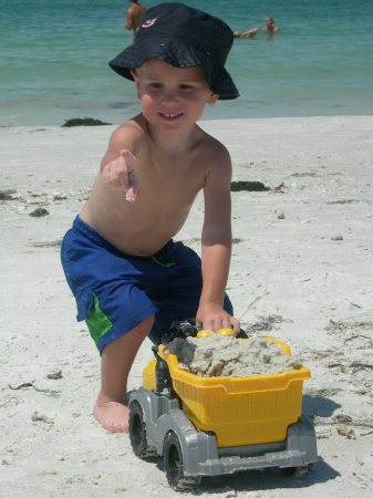 AJ at the beach with Uncle Nick