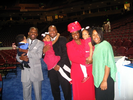 After the ordination ceremony of Marlon Sr., marlon Jr. and myself are standing with our Michigan pastor and his wife.