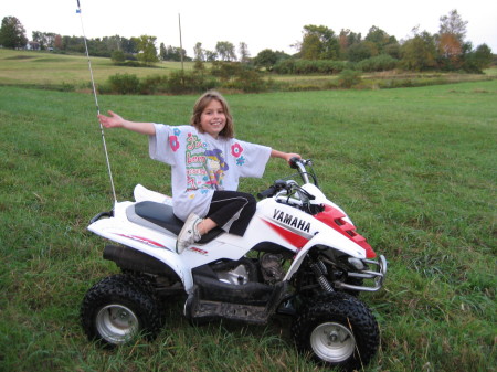 Lilly on her ATV