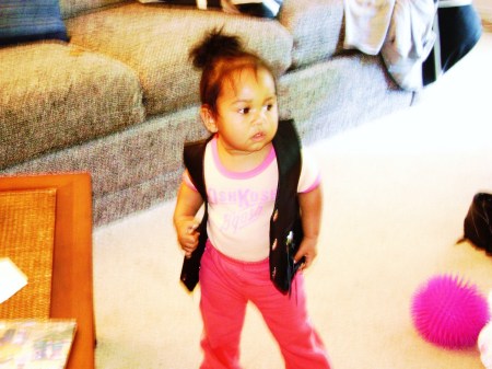 My baby Amelia in her new motorcycle vest.