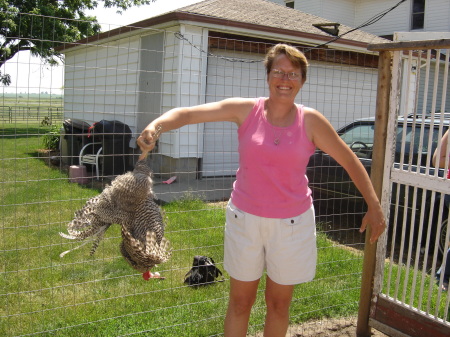 My wife dangling a friends chicken....