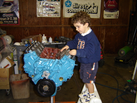 David helping daddy build a motor