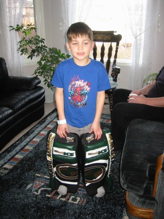 Alex with his new goalie pads for 7th birthday