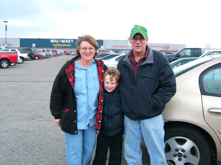 husband and me with our grandson