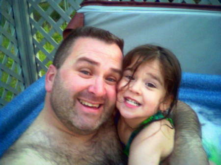 My buddie and I swimming in our jacuzzi May 2006