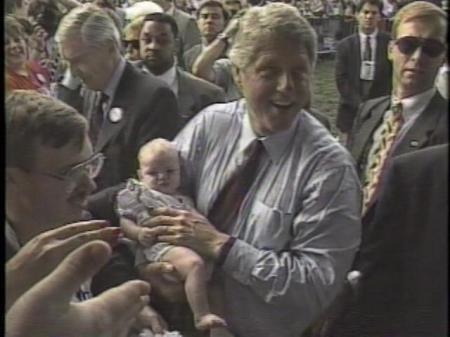 Future President Bill Clinton holding my daughter, Elizabeth