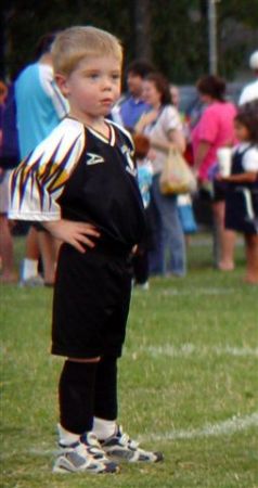 Tom playing soccer