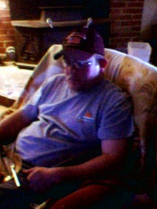 Bob in his recliner drinking a beer