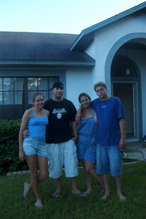 My Kids in front of our old house in Florida