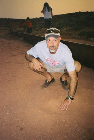 Me unearthing a dinosaur track in Utah, 2005