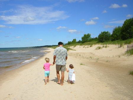 Strolling along the shore of Lake Michigan with my daughters.