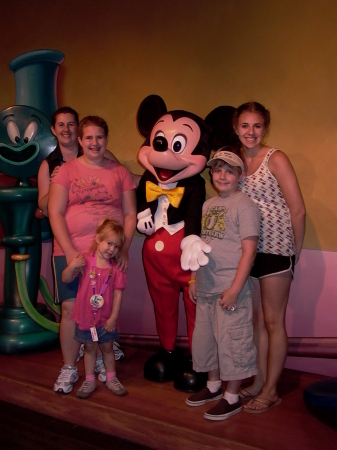 The Cepeda family with Mickey Mouse