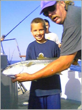 Nick with his first yellow tail