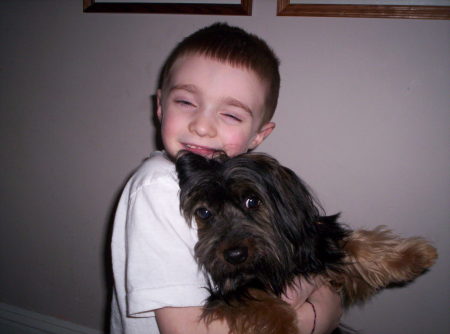 This is my son, Joshua and my dog Buster