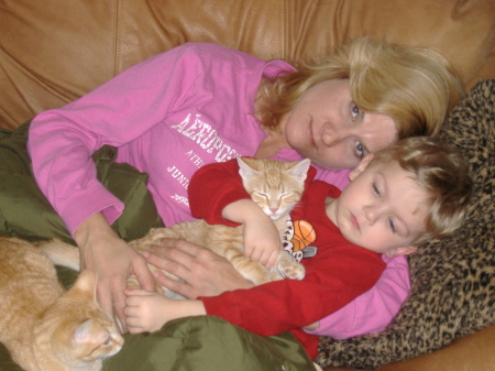 youngest son Jaden and the kitties.