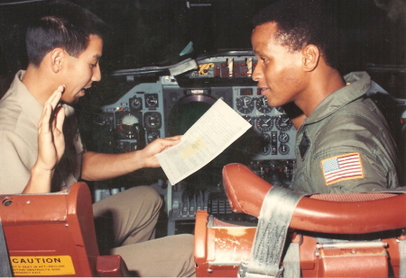 reenlisting in the U.S. Navy 1989. Lt. John Ujihara doing the honors