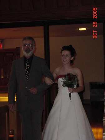 Stan and Steff going down the isle.