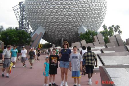 The wife & kids at Epcot