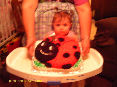 Holli and her 1st b.day cake