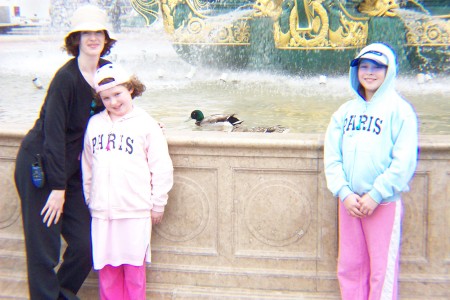 Girls in front of a fountain