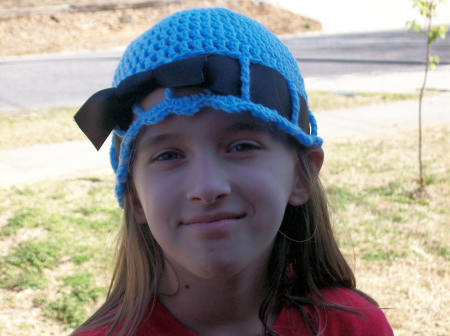 Kelley modeling a blue hat, 2008