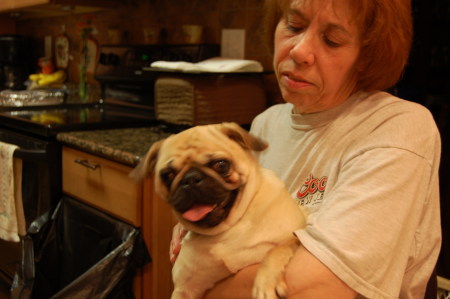 MY WIFE HOLDING OUR DOG OOGIE