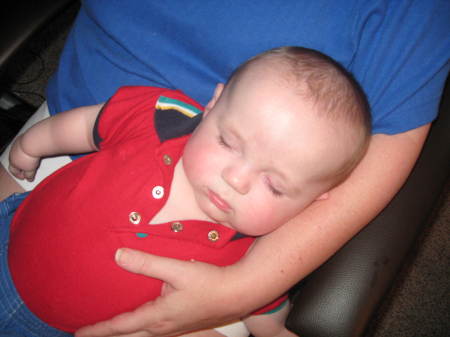 Aidan asleep on Mom's lap