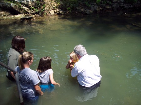 My grandaughter, Payton, being baptized.