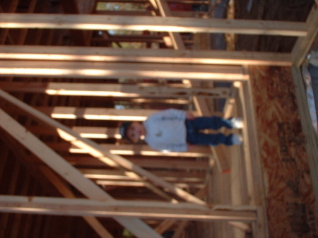 Kyle  building our new house  March 2003