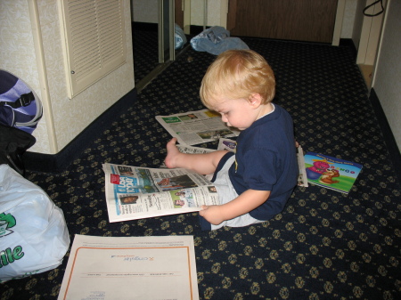 This is Jace who's our caboose looking at USA Today.  No interest in Barney thank goodness.