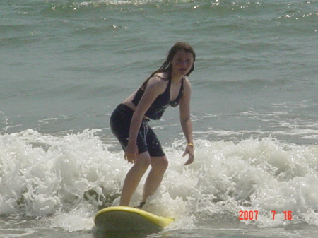 My daughter surfing