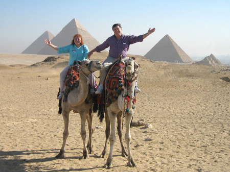 John and Aida on camels on the Giza plateau