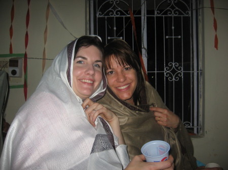 Wearing our Tamil shawls in India.