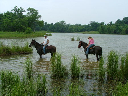 My husband, Tim, and daughter, Kendall, trail riding