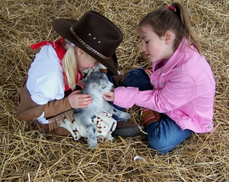 Elizabeth and Julia with our new baby goat. 01/07