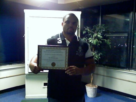 My son, Tyrell receiving his 4.0 award his freshman year at Florida A & M University