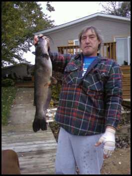 My husband Pete with a norther from our lake