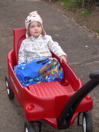 Holland in her new red wagon 2007