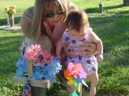 Tammy shows Larissa Robby's grave