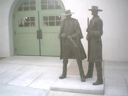 Statues of Wyatt Earp and Doc Holliday.