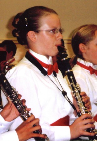 Playing her clarinet