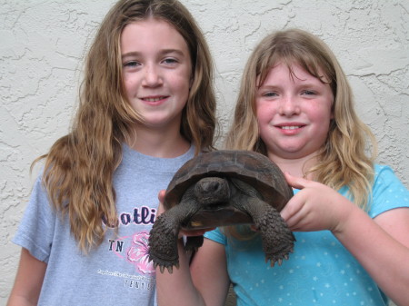 Mackenzie (on left) and her friend with a gopher tortoise