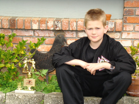 Robbie and his first trophy for Martial Arts...