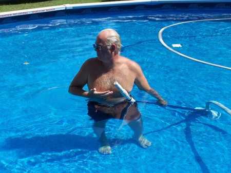 Me cleaning the pool, as always. Gotta love it!