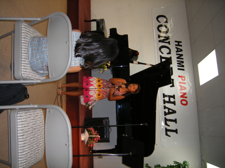 Talia at first piano recital