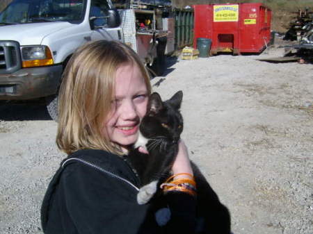 Chloe  9yrs and one of her many kitties