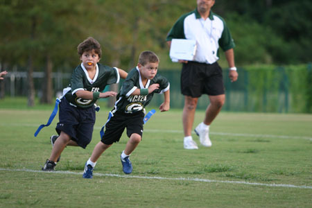 David (orange mouth piece) playing flag football (fall 2006)