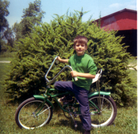 Me with my cool bike, age 6.