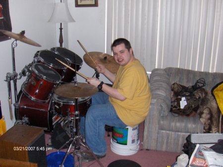 this reminds me middle school just kidding it is fooling around on the drum set just kidding it is me at my apartment in west anchorage